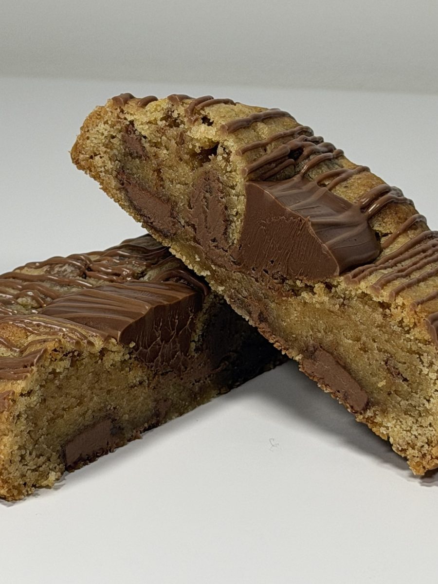 Oh G cookie halves with melted chocolate